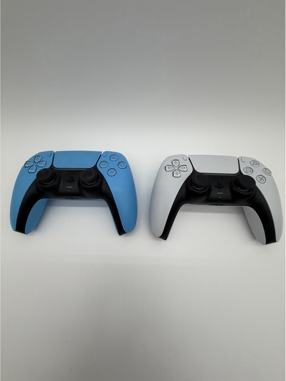 Sony PlayStation 5 DualSense Controllers Blue And White One Has Stick Drift